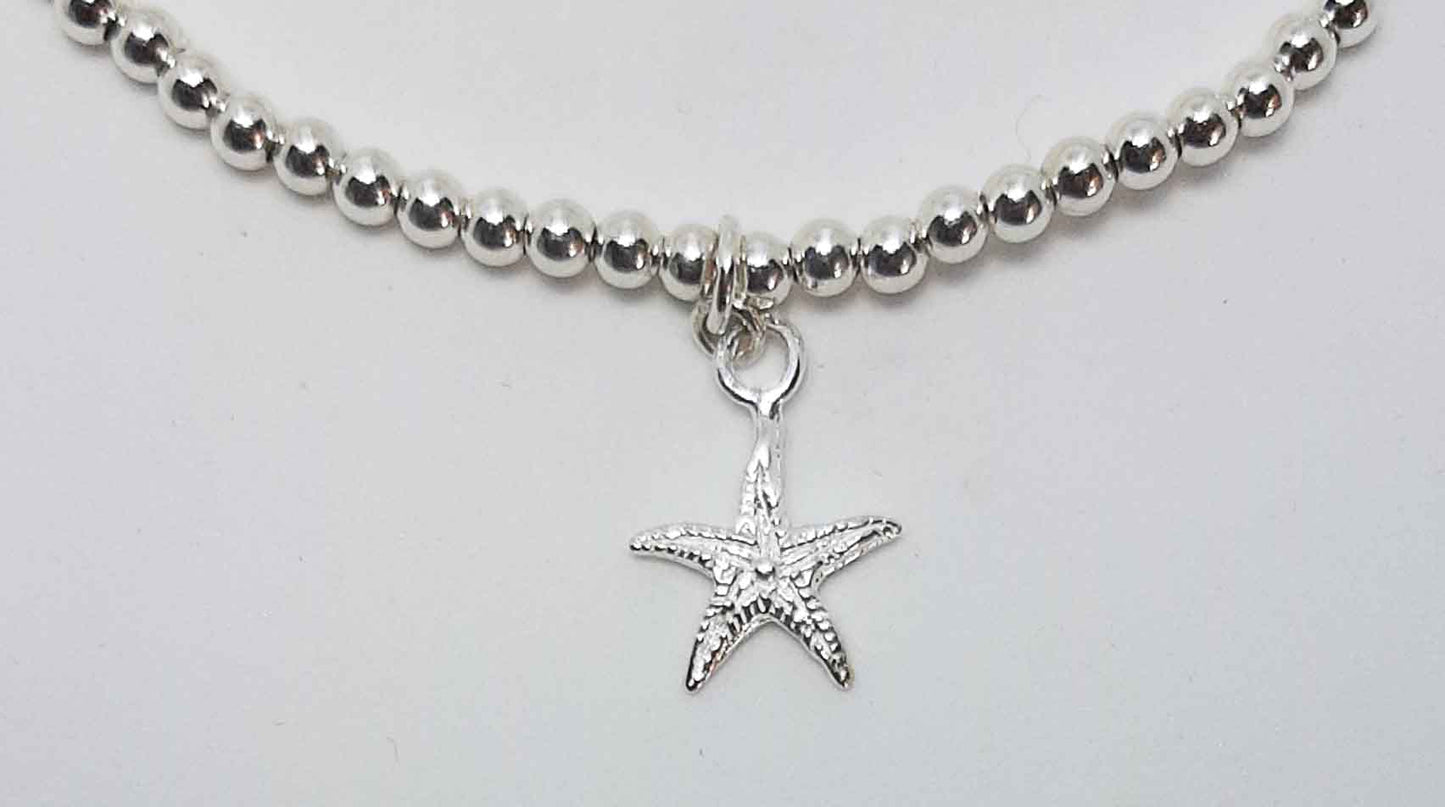 Pulsera bolitas estrella de mar