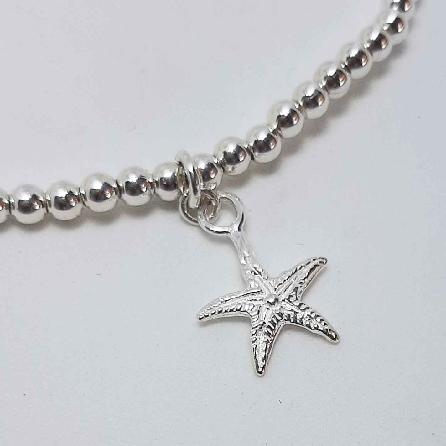 Pulsera bolitas estrella de mar