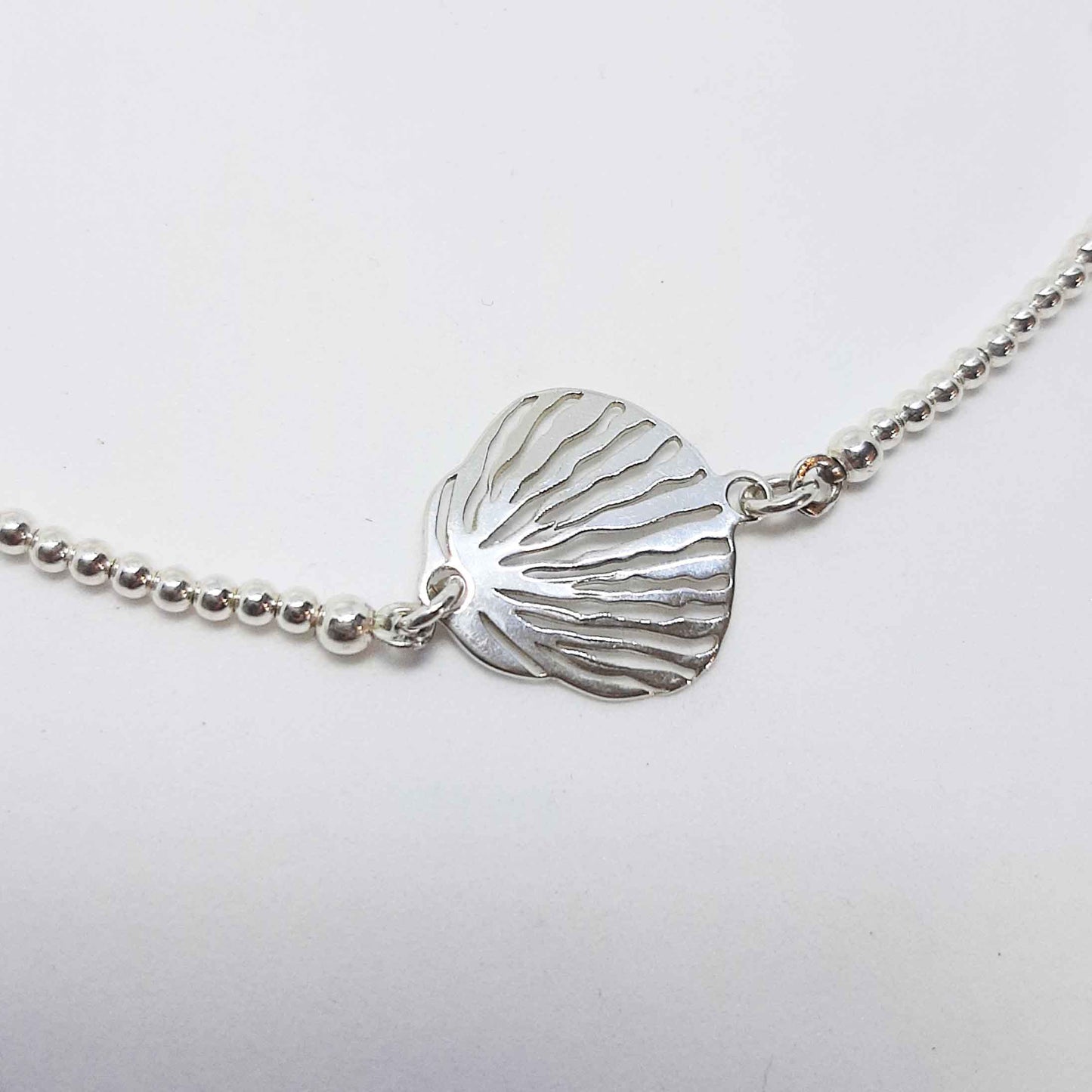 Pulsera bolitas finas shell