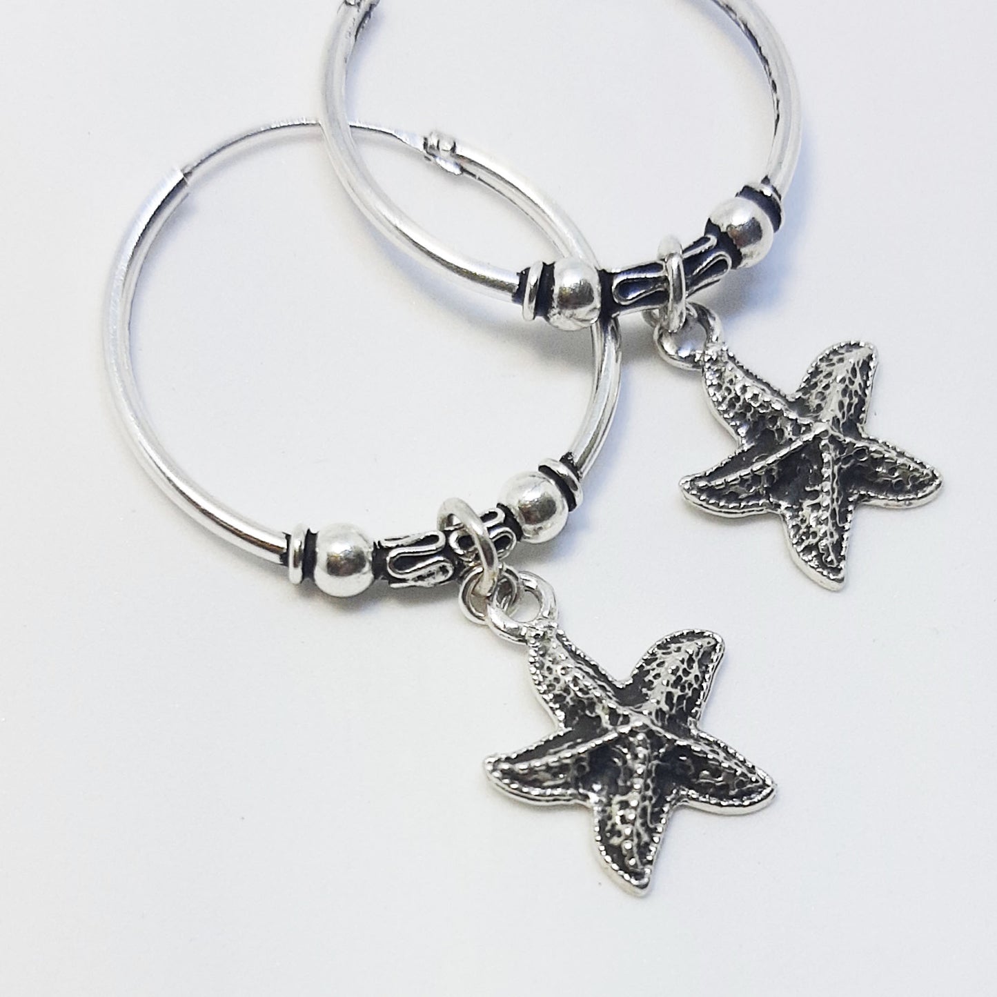 Aros argolla Bali + Estrella de mar 2